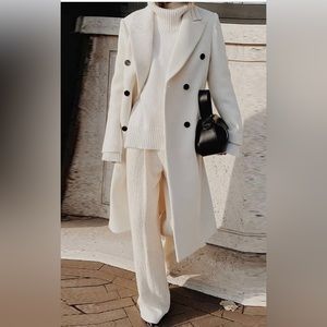 White coat with black buttons